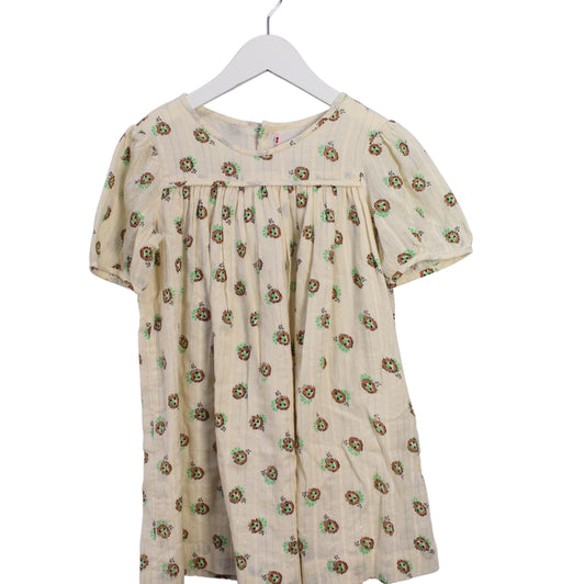 A Ivory Short Sleeve Dresses from Bonpoint in size 4T for girl. (Front View)