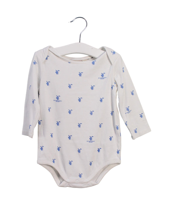 A White Long Sleeve Bodysuits from Burberry in size 6-12M for boy. (Front View)