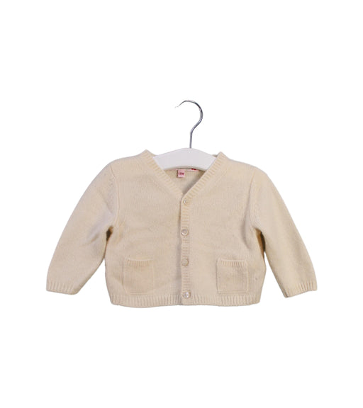 A Ivory Cardigans from Bonpoint in size 6-12M for girl. (Front View)