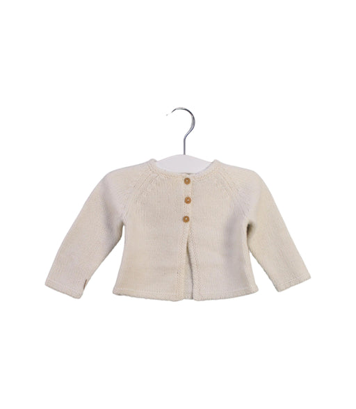 A Ivory Cardigans from Bonton in size 3-6M for girl. (Front View)