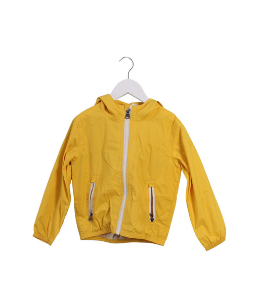 A Yellow Lightweight Jackets from Aigle in size 4T for girl. (Front View)