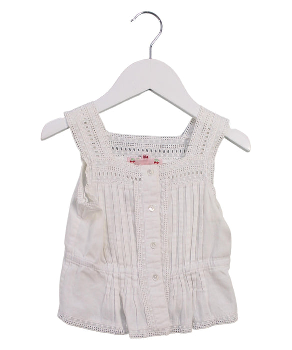 A White Sleeveless Tops from Bonpoint in size 4T for girl. (Front View)