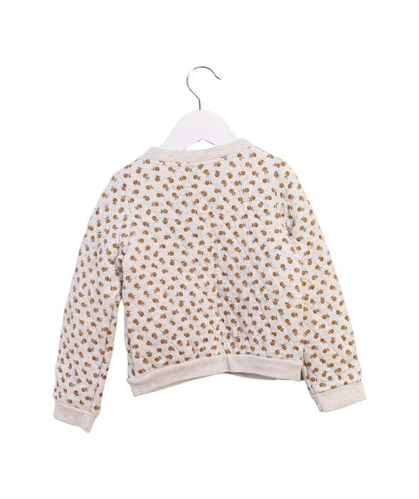 A Beige Puffer/Quilted Jackets from Petit Bateau in size 4T for girl. (Back View)