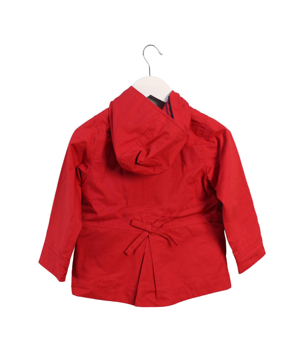 A Red Lightweight Jackets from Jacadi in size 4T for girl. (Back View)