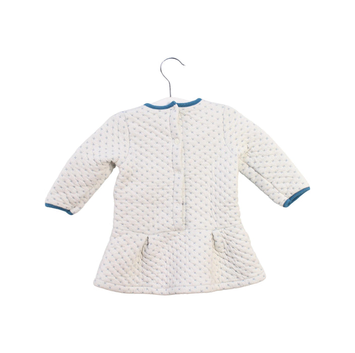 A White  from Petit Bateau in size 6-12M for girl. (Back View)