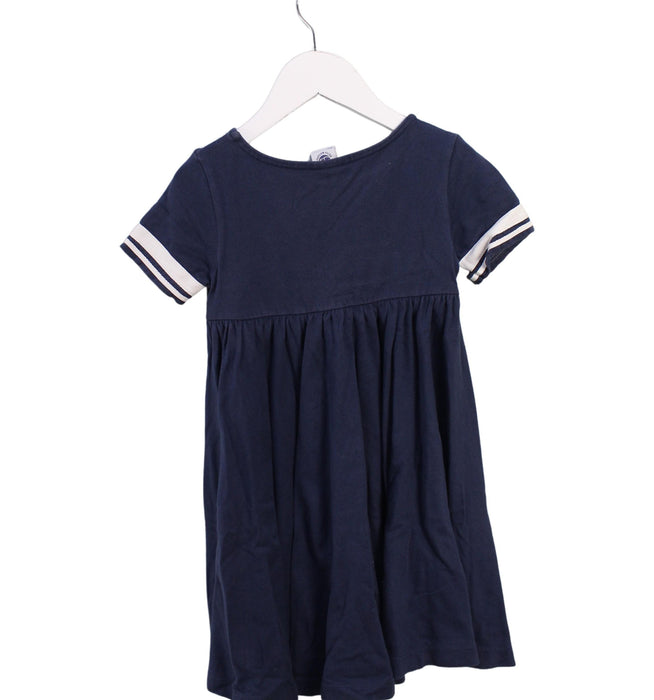 A Navy Short Sleeve Dresses from Petit Bateau in size 4T for girl. (Back View)