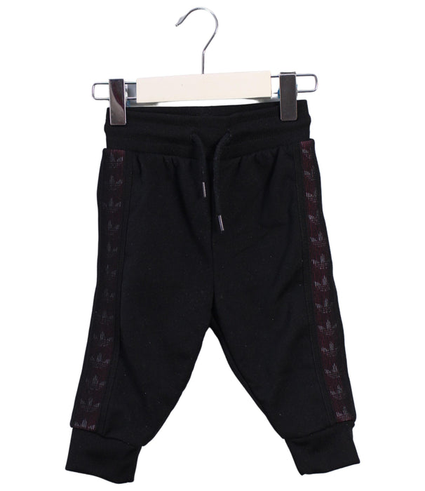 A Black Sweatpants from Adidas in size 6-12M for boy. (Front View)