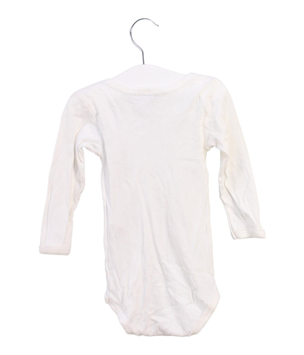 A White Long Sleeve Bodysuits from Petit Bateau in size 6-12M for girl. (Back View)