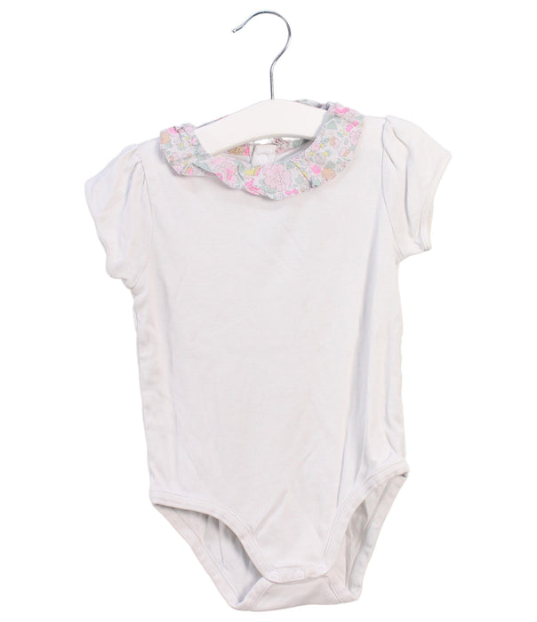 A White Short Sleeve Bodysuits from Jacadi in size 3T for girl. (Front View)
