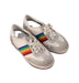A White Sneakers from Gucci in size 4T for girl. (Front View)