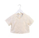 A Beige Short Sleeve Tops from Louise Misha in size 4T for girl. (Front View)