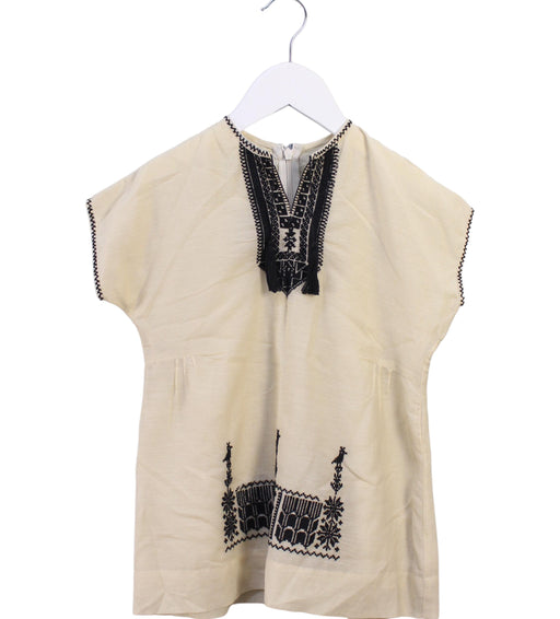 A Beige Short Sleeve Dresses from Caramel in size 4T for girl. (Front View)