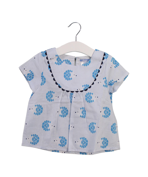 A Blue Short Sleeve Tops from Jacadi in size 4T for girl. (Front View)