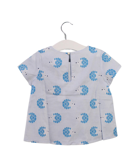 A Blue Short Sleeve Tops from Jacadi in size 4T for girl. (Back View)