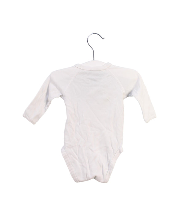 A White Long Sleeve Bodysuits from Petit Bateau in size 0-3M for girl. (Back View)