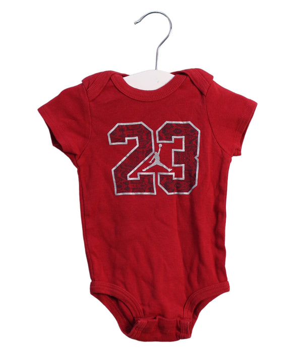 A Red Short Sleeve Bodysuits from Air Jordan in size 6-12M for boy. (Front View)