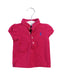 A Pink Short Sleeve Polos from Ralph Lauren in size 6-12M for girl. (Front View)