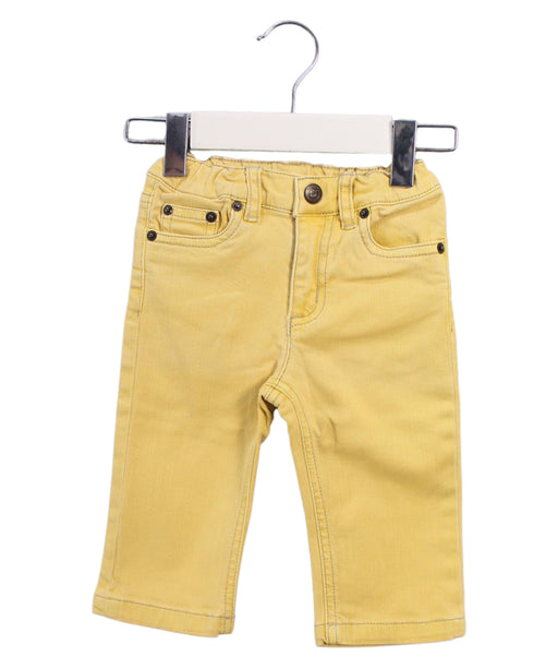 A Yellow Jeans from Bonpoint in size 3-6M for girl. (Front View)