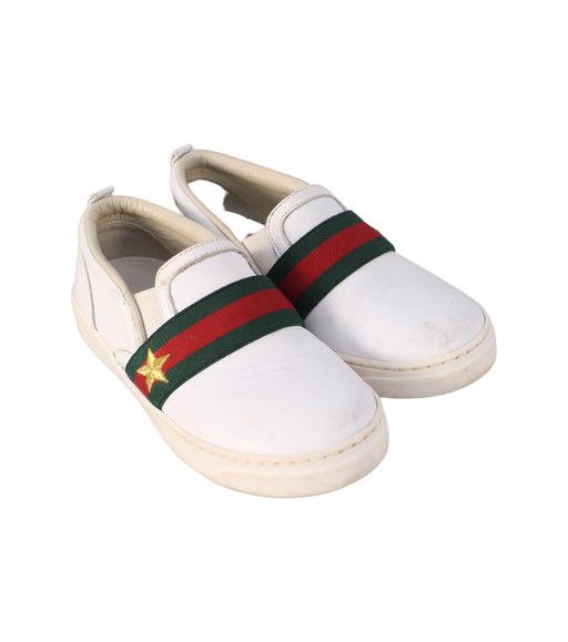 A White Slip Ons from Gucci in size 4T for neutral. (Front View)