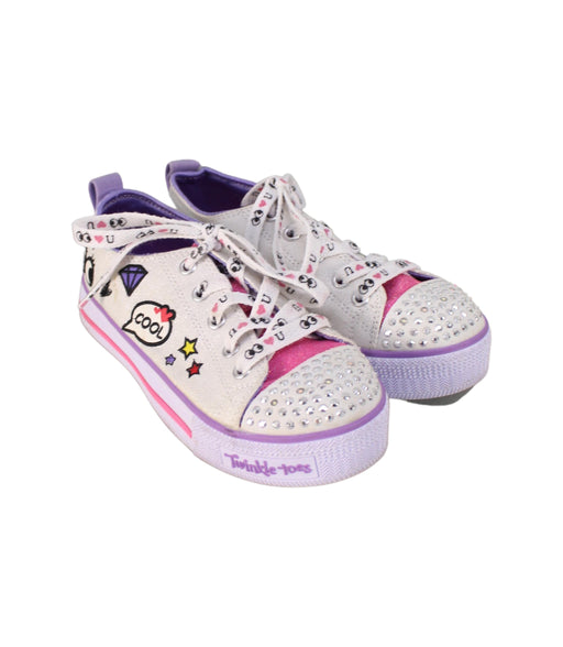 A White Sneakers from Skechers in size 7Y for girl. (Front View)