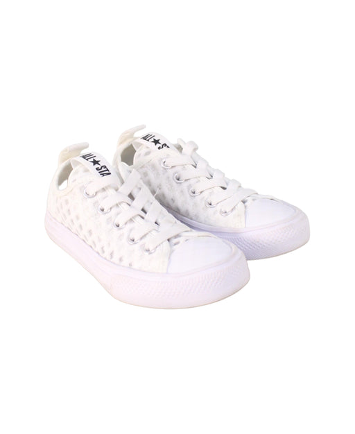 A White Sneakers from Converse in size 5T for girl. (Front View)