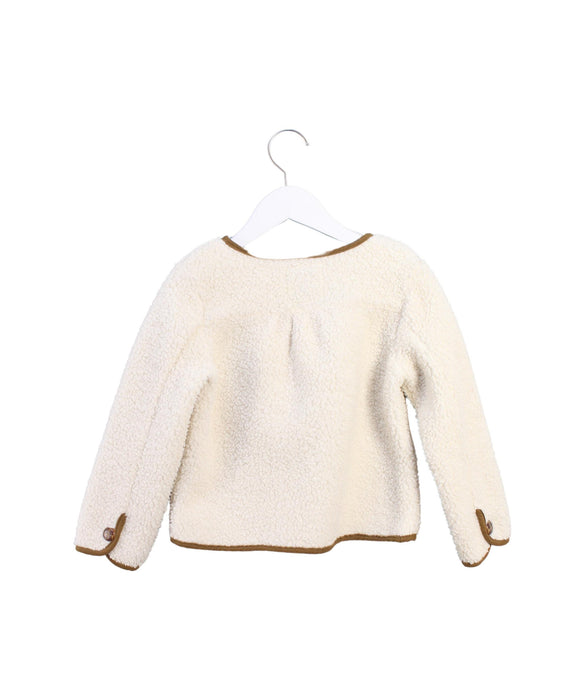 A White Cardigans from Cyrillus in size 6T for neutral. (Back View)