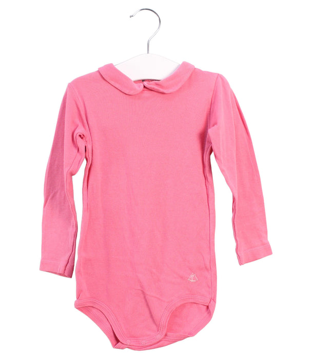 A Pink Long Sleeve Bodysuits from Petit Bateau in size 18-24M for girl. (Front View)