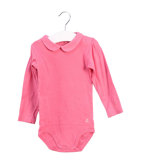 A Pink Long Sleeve Bodysuits from Petit Bateau in size 18-24M for girl. (Front View)