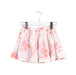 A White Short Skirts from Bonton in size 4T for girl. (Front View)