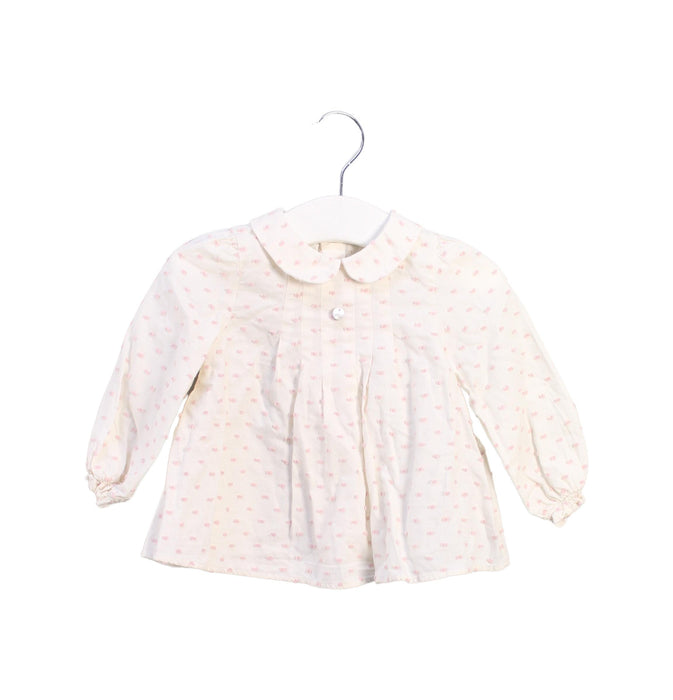 A Ivory Long Sleeve Tops from Purete du... Bebe in size 6-12M for girl. (Front View)