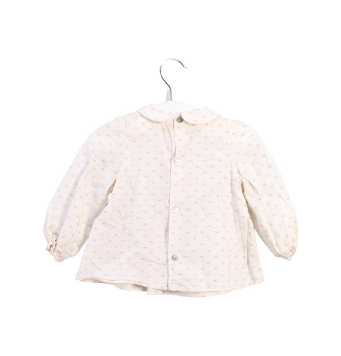 A Ivory Long Sleeve Tops from Purete du... Bebe in size 6-12M for girl. (Back View)