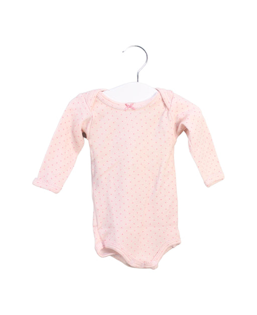 A Pink Long Sleeve Bodysuits from Petit Bateau in size 3-6M for girl. (Front View)