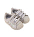 A White Sneakers from Adidas in size 12-18M for girl. (Front View)