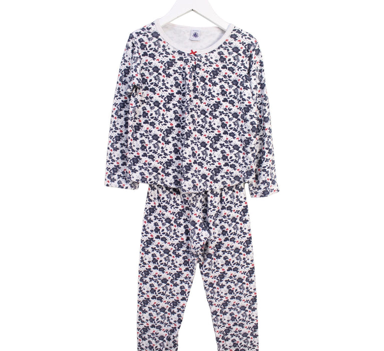 A White Pyjama Sets from Petit Bateau in size 8Y for girl. (Front View)