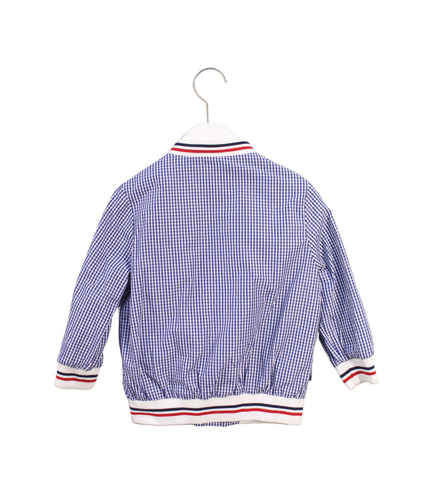 A White Lightweight Jackets from Ferrari in size 3T for boy. (Back View)