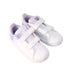 A White Sneakers from Adidas in size 4T for girl. (Front View)