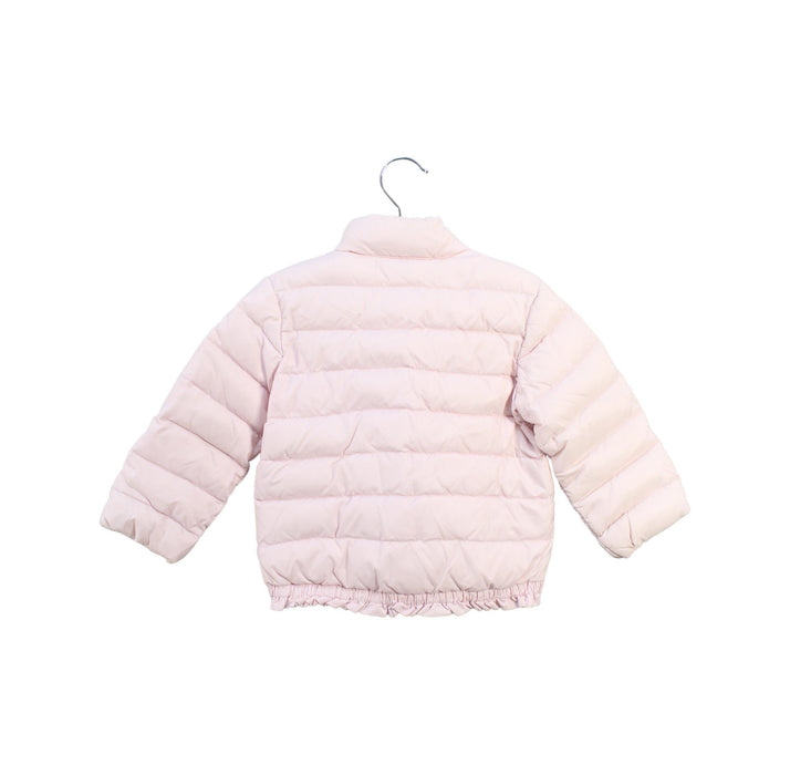 A Pink Puffer/Quilted Jackets from Ralph Lauren in size 12-18M for girl. (Back View)