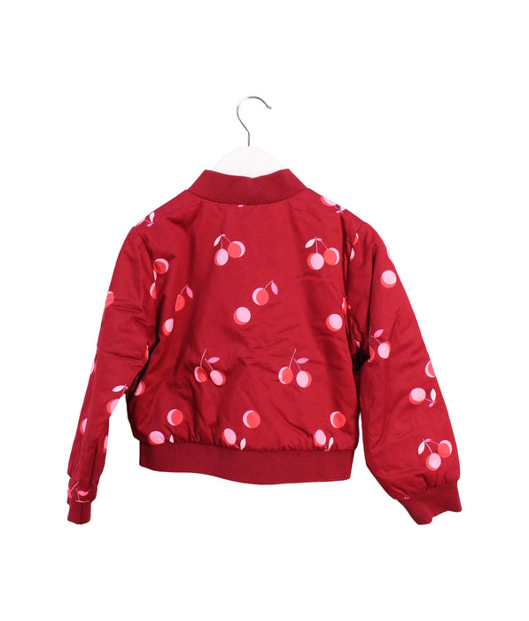 A Red Lightweight Jackets from Jacadi in size 6T for girl. (Back View)