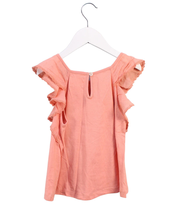 A Peach Short Sleeve Tops from Bonheur du Jour in size 6T for girl. (Back View)