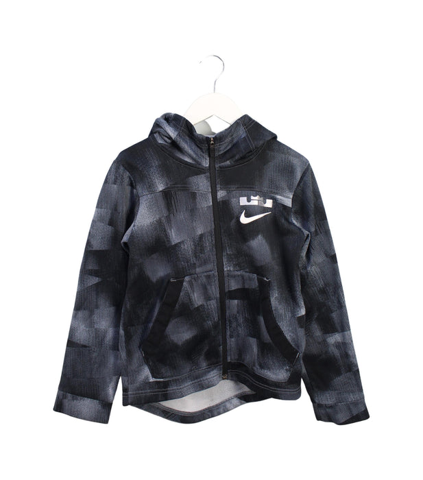 A Black Lightweight Jackets from Nike in size 10Y for boy. (Front View)