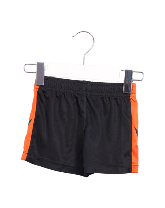 A Black Active Shorts from Macron in size 3-6M for boy. (Front View)