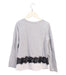 A Grey Long Sleeve Tops from Juicy Couture in size 6T for girl. (Back View)