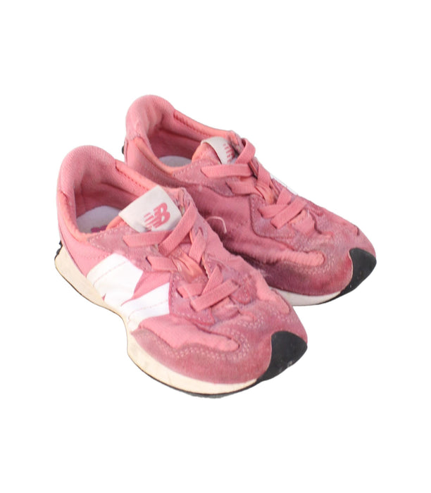 A Pink Sneakers from New Balance in size 5T for girl. (Front View)