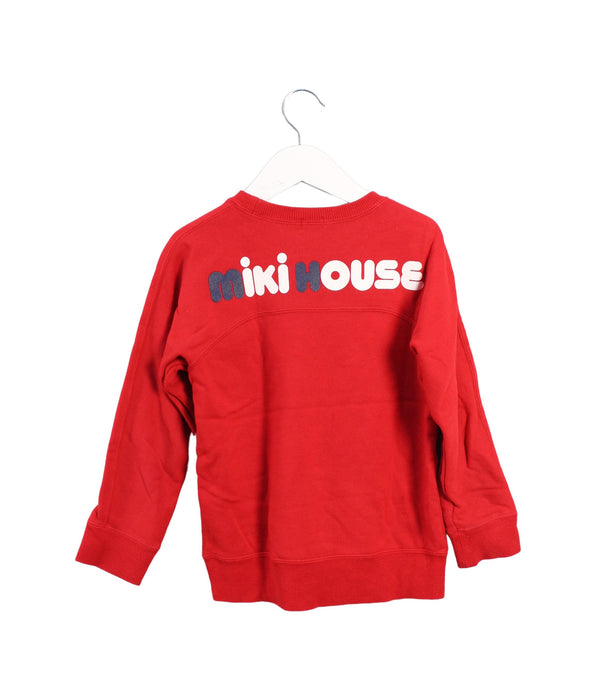 A Red Crewneck Sweatshirts from Miki House in size 5T for boy. (Back View)