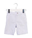 A Blue Shorts from Jacadi in size 2T for girl. (Front View)