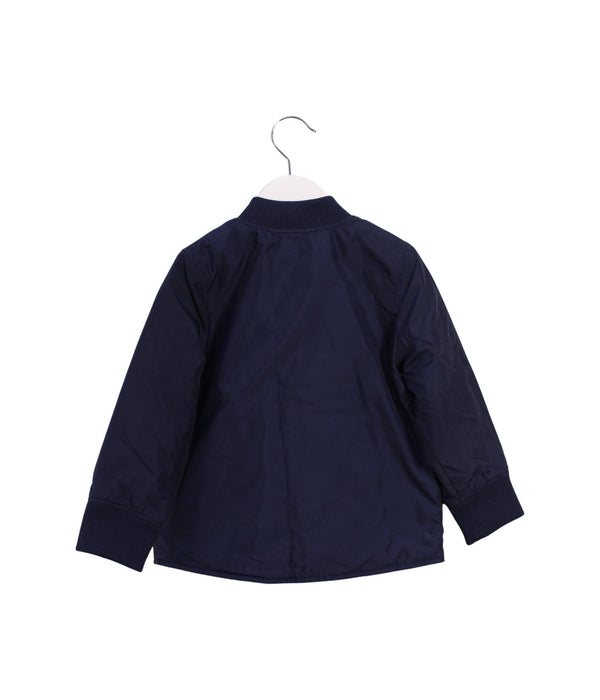 A Blue Lightweight Jackets from Arket in size 18-24M for boy. (Back View)