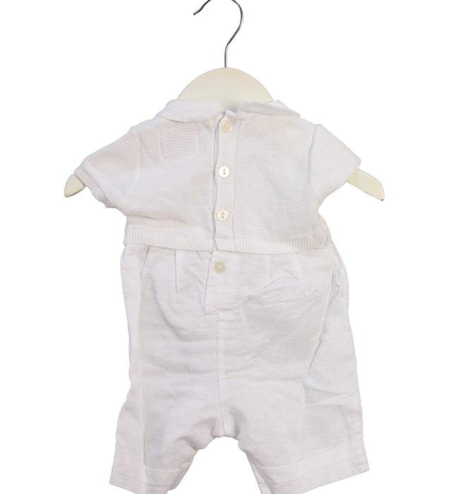 A White Rompers from Emile et Rose in size 0-3M for girl. (Back View)