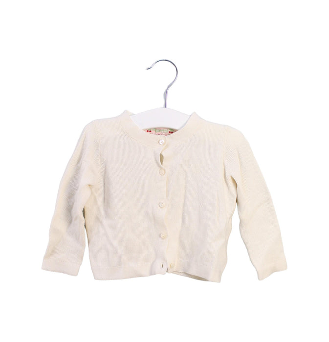 A White Cardigans from Bonpoint in size 6-12M for girl. (Front View)