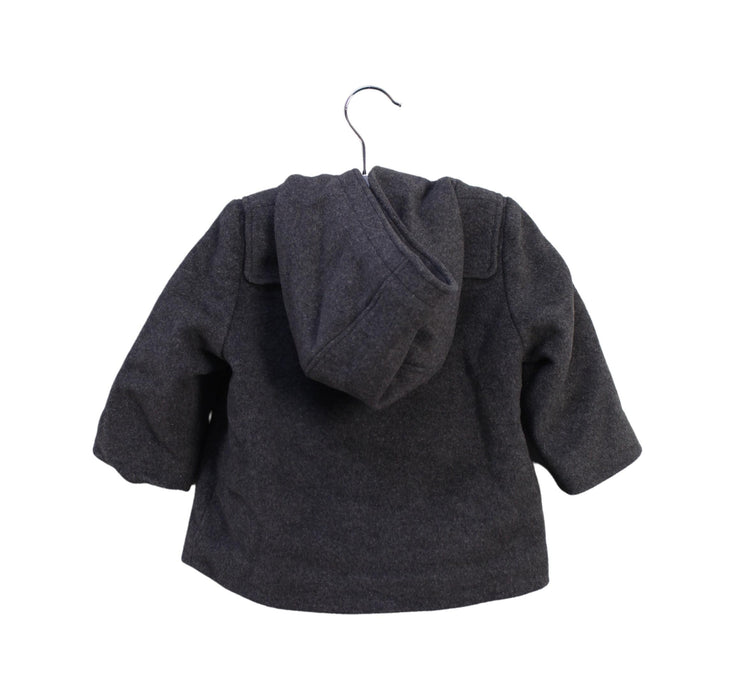 A Black Lightweight Jackets from Bonpoint in size 12-18M for boy. (Back View)