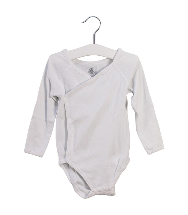 A White Long Sleeve Bodysuits from Petit Bateau in size 6-12M for girl. (Front View)